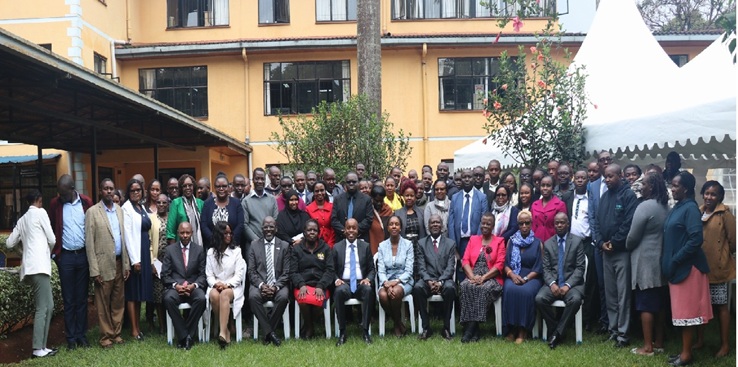 Allan Kosgey (Seated 5th from Left), KIPI Board Chairman, in group photo with fellow Board Members and staff after the meeting